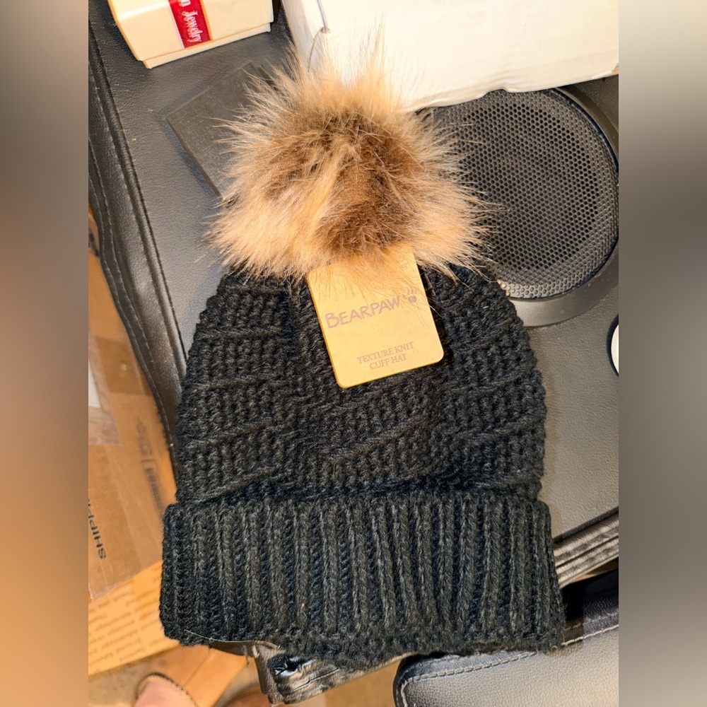 Bearpaw black winter hat with tan/brown pompom NWT